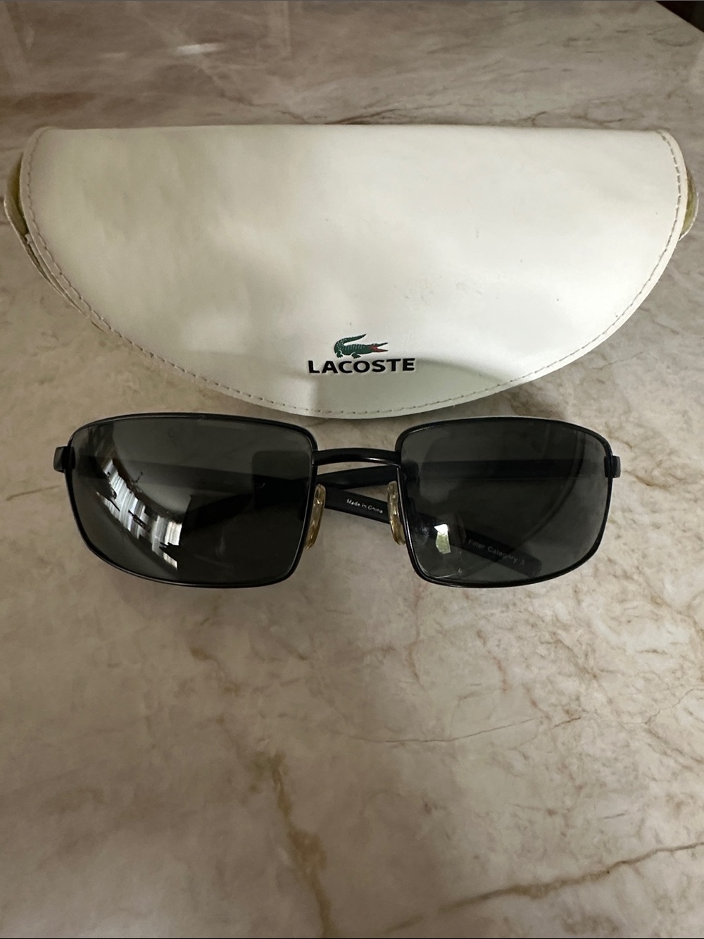 Lacoste Men sunglasses and case
